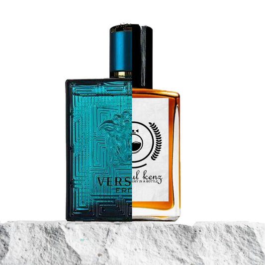 "A stylish image features two distinct perfume bottles displayed on a textured surface."
"On the left, a vibrant blue bottle labeled Versace Eros, exuding a bold, luxurious appeal."
"The Versace Eros bottle has a striking, deep blue hue with intricate details and a classic design, representing passion and elegance."
"On the right, an amber-colored bottle labeled "Baytulkenz", the inspired version of Versace Eros."
"The Baytulkenz bottle has a warm, amber tone with a sleek, modern design."