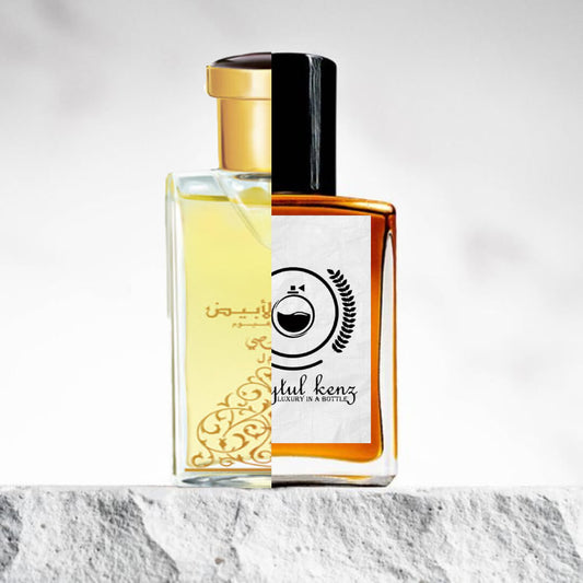 "Two elegant perfume bottles are displayed on a white textured backdrop."
"On the left, a bottle labeled Oudh Al Abiad Rasasi, featuring ornate gold detailing and Arabic writings, exuding a luxurious and traditional design."
"On the right, an amber-colored bottle with a black cap, representing the Baytulkenz inspired version of Oudh Al Abiad Rasasi, offering a sleek, refined, and modern appearance."
"Both bottles share a sophisticated aesthetic, with the Baytulkenz version offering a contemporary twist."